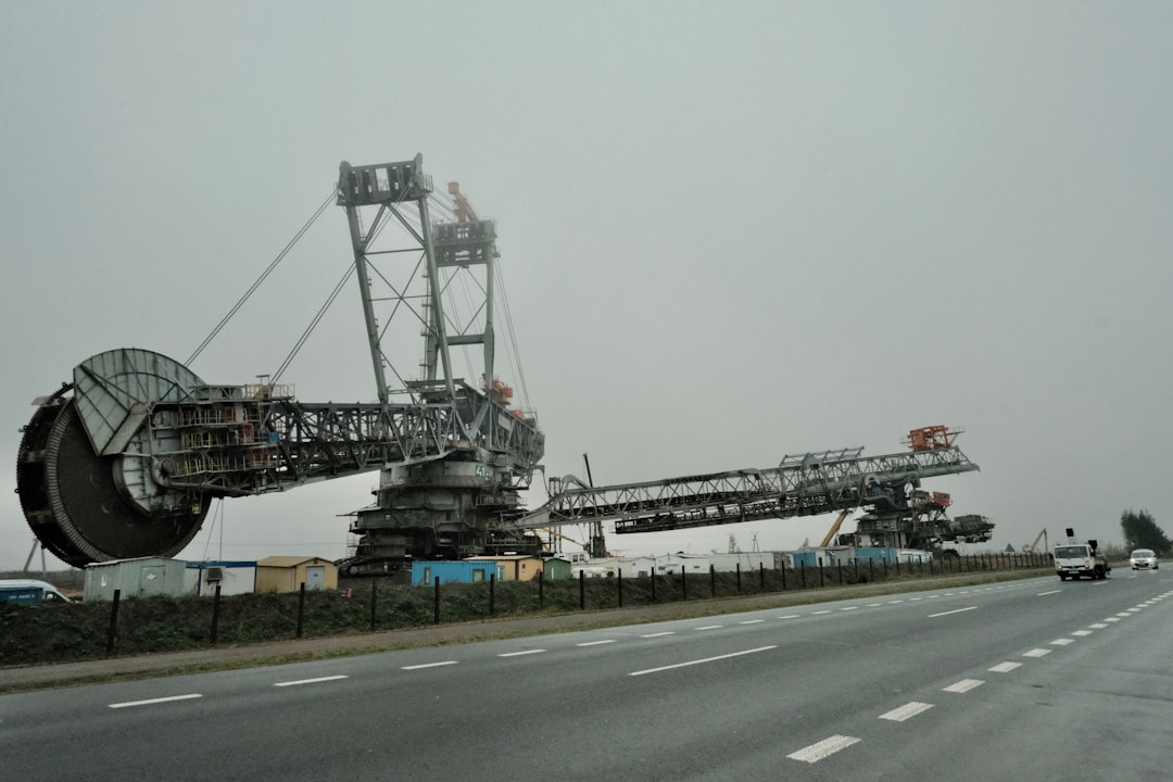 The Bagger 288 in broadside, the site cabins at its feet provided for scale rather than for shelter.