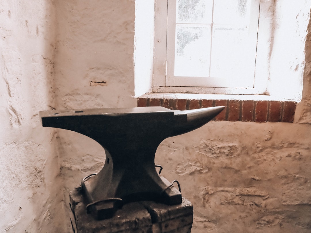 An anvil, embodying immovability under raking light.