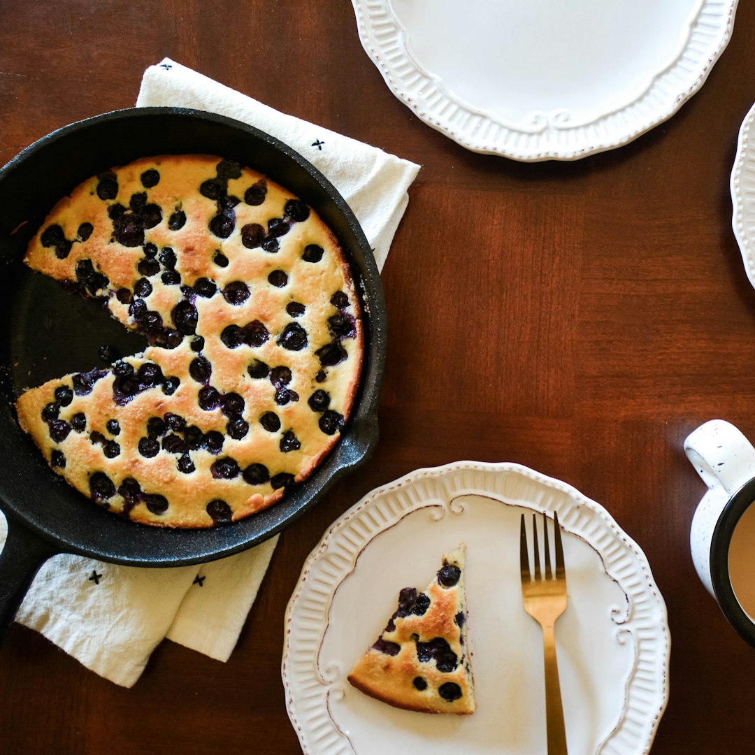 A showcase of cast iron's culinary prowess, with blueberries merely accepting their fate.