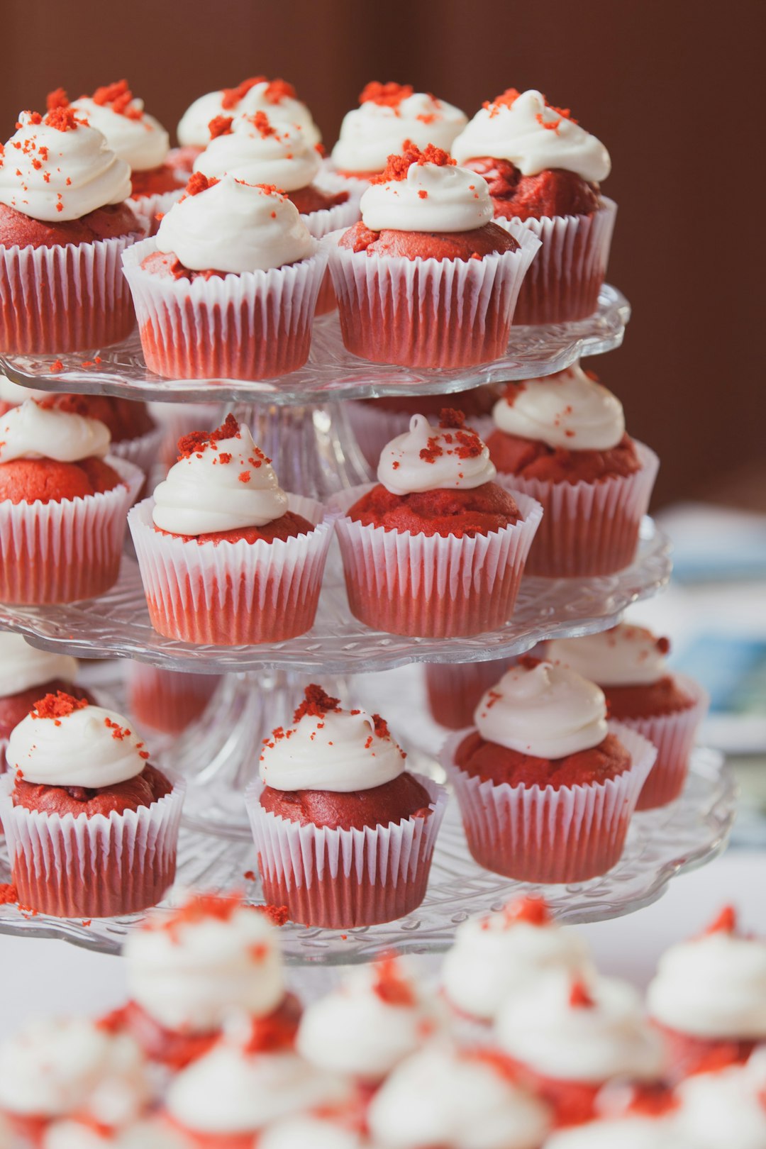 Cupcake tower with red velvet cupcakes.