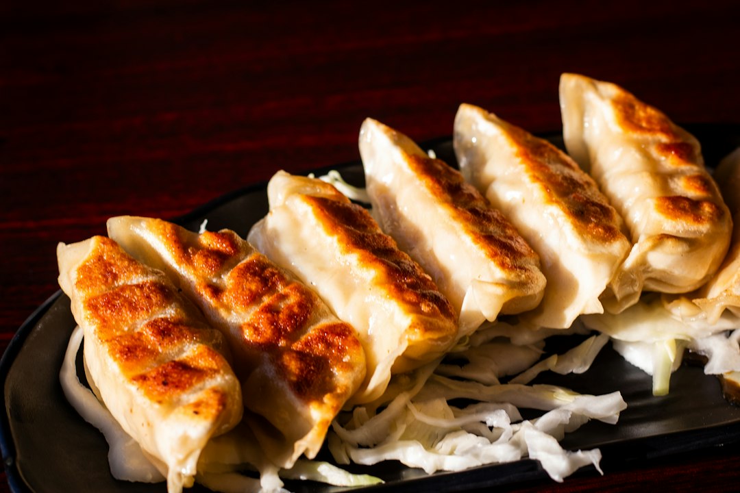A plate of gyoza dumplings.