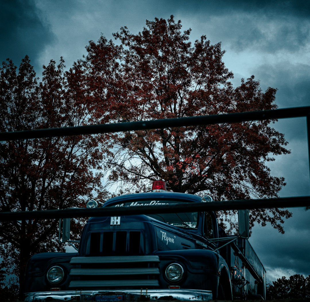 The firefighting pumper in its natural habitat, commanding the road with effortless dominance.