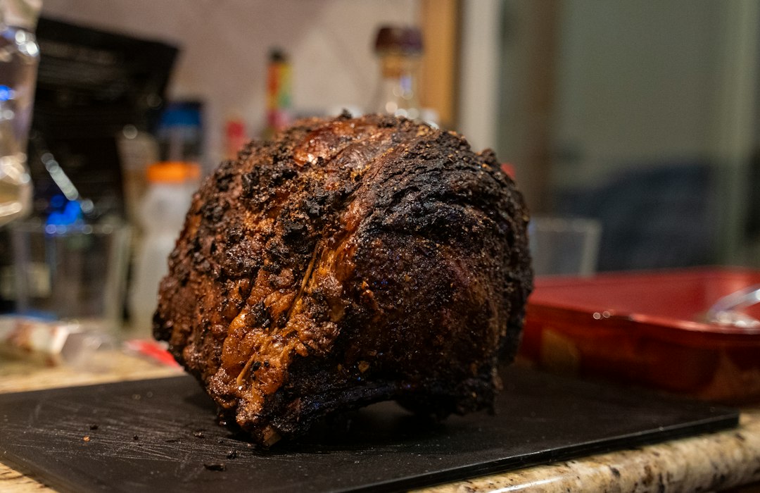 Prime rib roast on a cutting board.