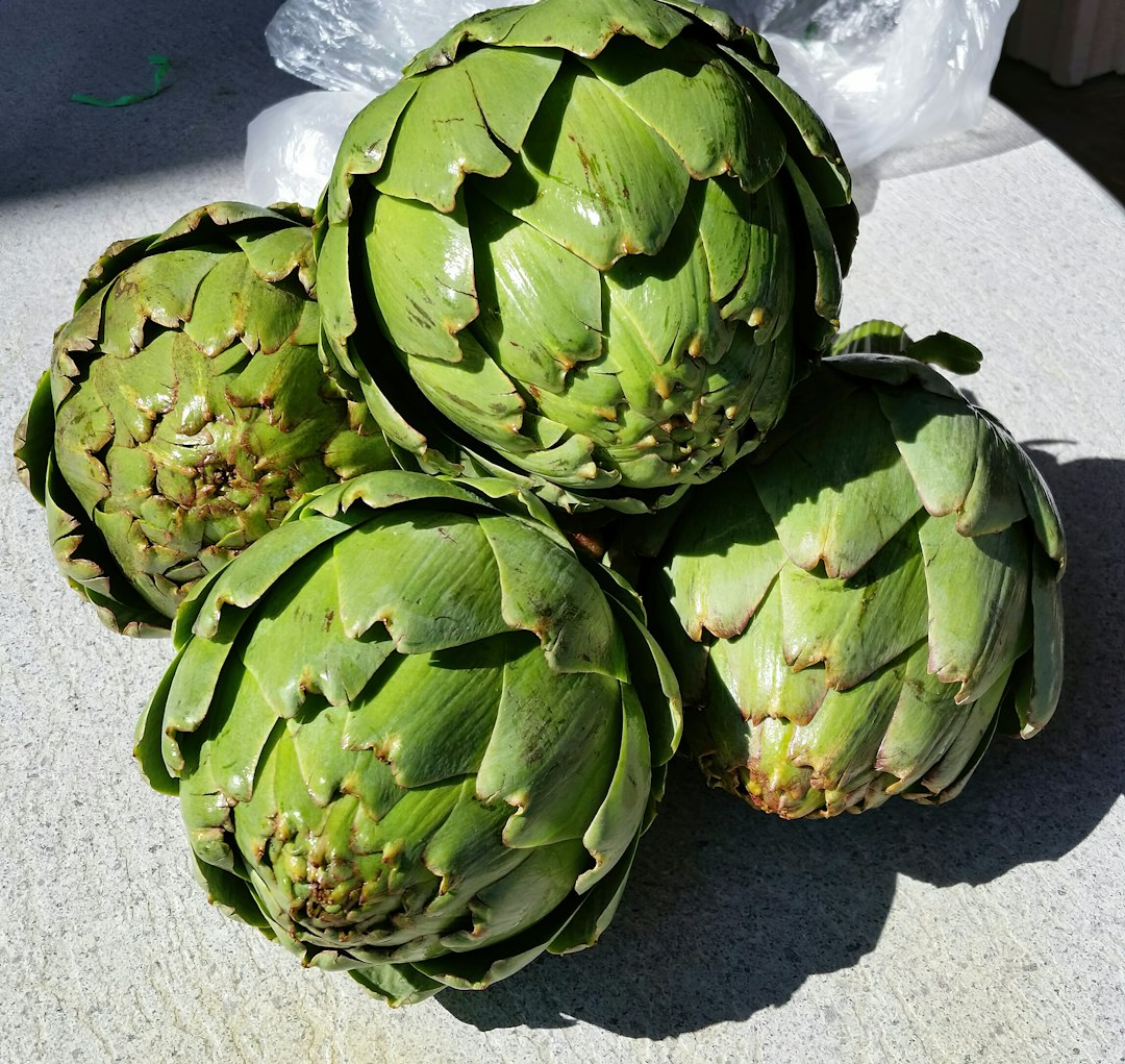 Group of fresh artichokes.