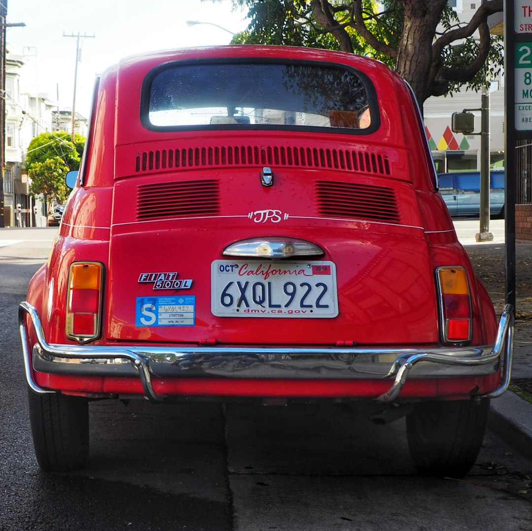 Fiat 500 car on the road.